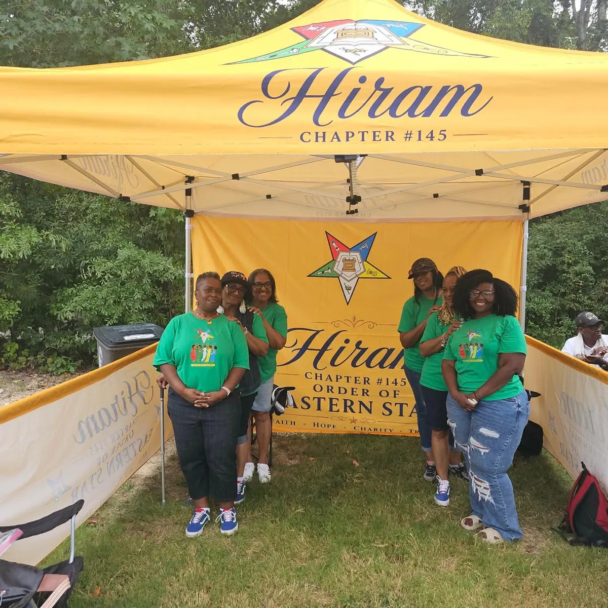 Hiram Chapter #145 gold custom printed canopy tent with full backwall and matching sidewalls at a community event